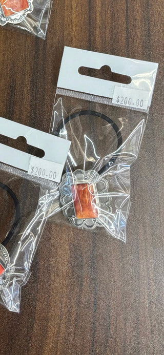 Bridgette - spiny hair tie (org/red??)