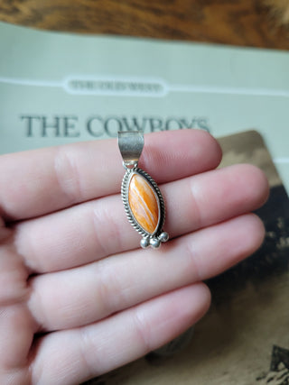The Carlisle Pendant - Orange Spiny