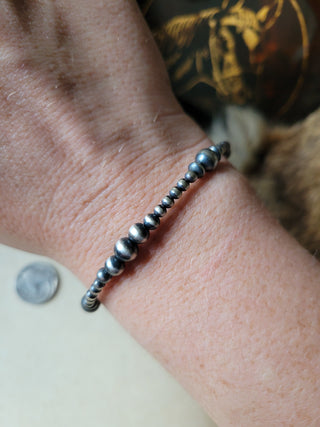 Graduated Pearl Clasp Bracelet