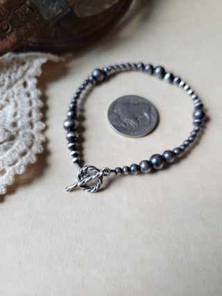Graduated Pearl Clasp Bracelet