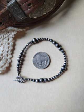Graduated Pearl Clasp Bracelet