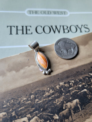 The Carlisle Pendant - Orange Spiny